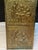 Antique English repoussé brass umbrella stand dating from the late 19th, featuring richly detailed figural relief panels...