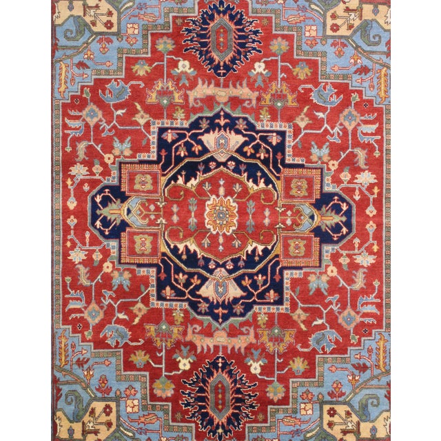 The Serapi Collection reinterprets traditional tribal geometric design through a refined palette. Each rug is hand-knotted...