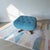 A striking vintage Heywood-Wakefield lounge chair and matching ottoman featuring a sculptural maple hardwood frame,...