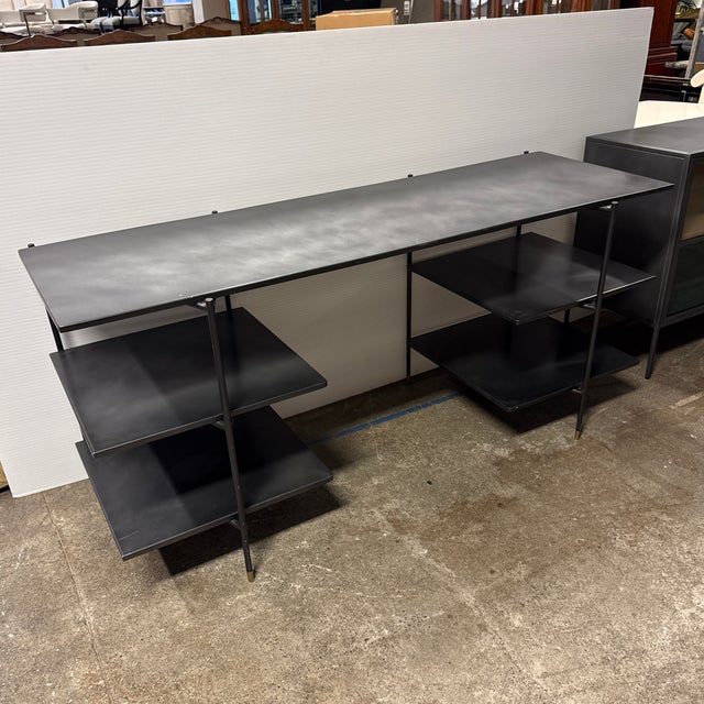 Design Plus Gallery presents the Rockwell Vito Desk Distressed Iron from Four Hands. This industrial-inspired desk is...
