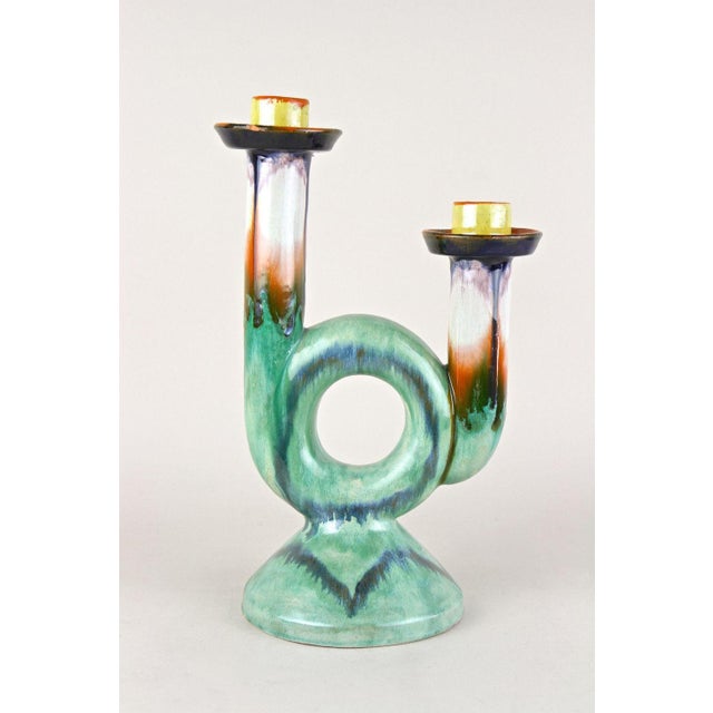 Extraordinary mid century ceramic candle holder from the period around 1950 in Austria. This out of the ordinary designed...