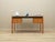 The desk was made in the 1970s, Danish production. The structure and the top of the furniture are covered with ash veneer....