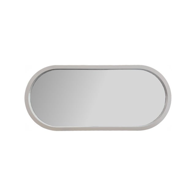 The Osman Mirror features an elegant elongated oval shape with softly rounded edges, offering a clean, modern silhouette...