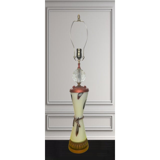This exquisite table lamp is a stunning fusion of traditional craftsmanship and modern design aesthetics. The lamp's body...