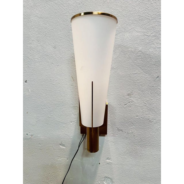 Elegant, modern-style wall sconce, perfect for refined settings such as living rooms, bedrooms, hallways or commercial...
