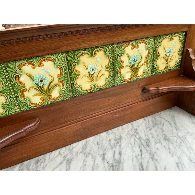 Step into the elegance of yesteryear with this stunning antique vanity cabinet, a true testament to exquisite...