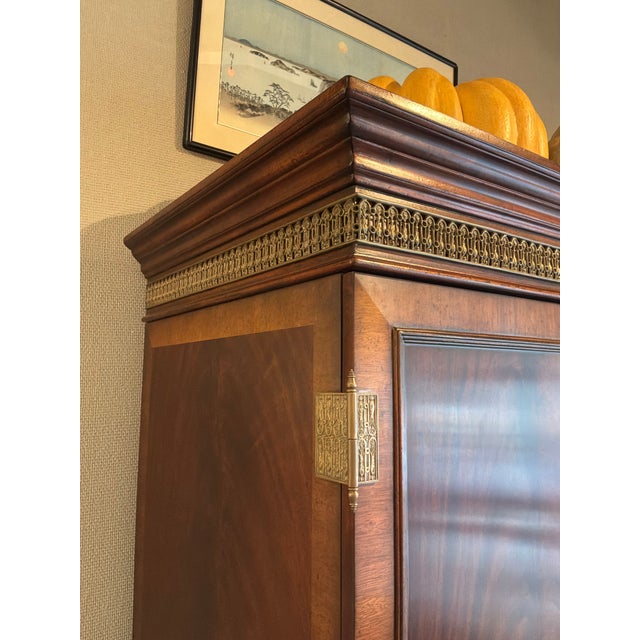 Traditional Jonathan Charles Gentleman's Armoire. Warm mahogany wood, gold hardware, 1 hanging bar inside. Extra large...
