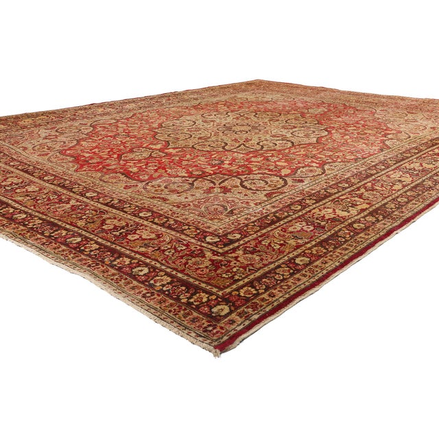 74937 Haji Khalili Antique Persian Tabriz Rug, 10'10 x 13'08. Like an opulent garden in full bloom, this hand knotted wool...