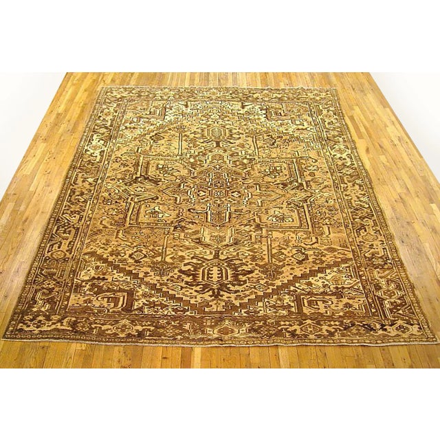Vintage Persian Heriz Oriental rug, Room size A vintage Persian Heriz oriental rug, size 11'2" x 9'0", circa 1950. This...
