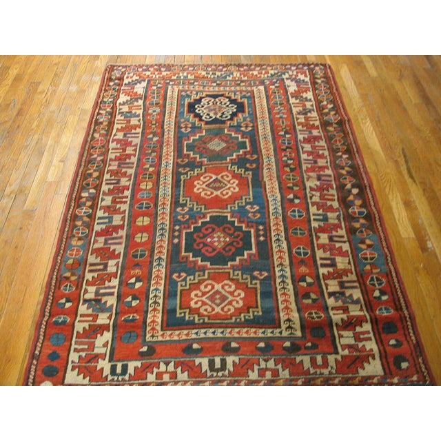 Antique Caucasian - Kazak rug, measures: 4'3" x 6'2". Antique Caucasian Caucasian Blue 1880s Rug, Circa Date: 1880s. This...