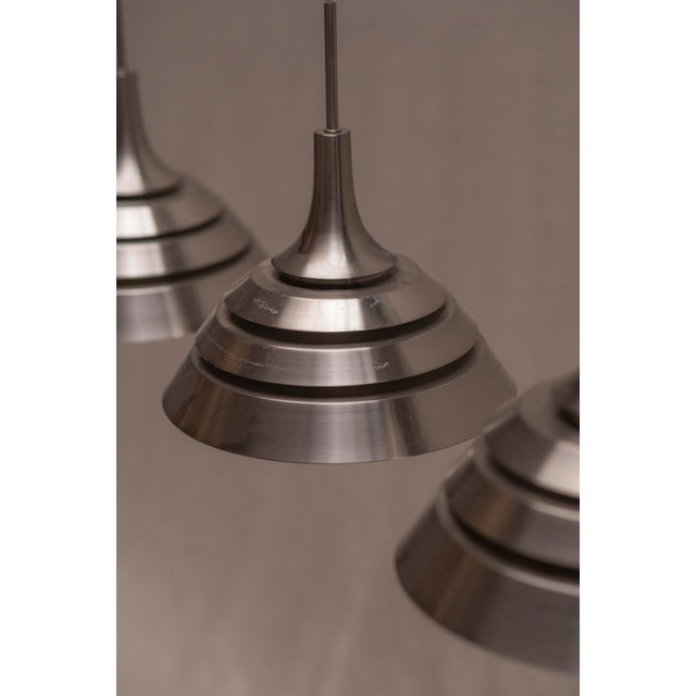 A beautiful set of three minimalist pendant lamps designed in the style of hans-agne jakobsson for hans-agne jakobsson ab,...