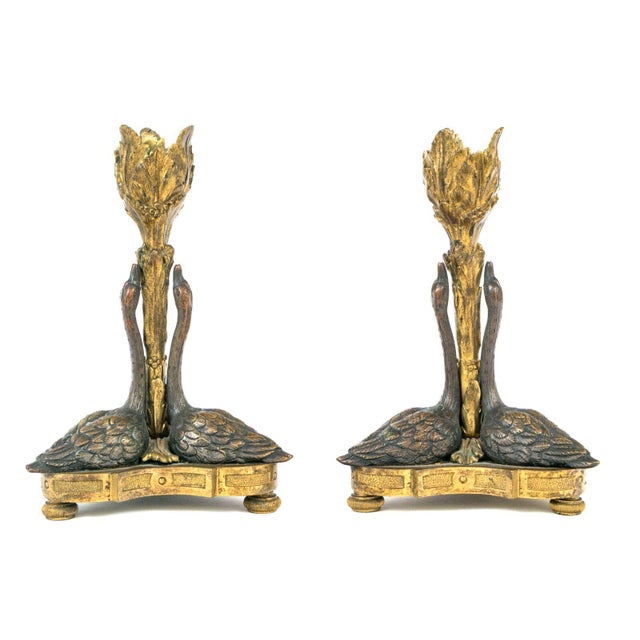 An exceptional pair of 19th-century English William IV parcel-gilt ormolu and patinated bronze candlesticks. This rare...