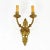 Empire-style wall lamp made in France in the 1930s. Luxurious brass wall lamp that will bring elegance and a glamorous...