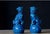 This striking pair of blue glazed porcelain guardian lions brings a bold, elegant presence to any interior. Each lion is...