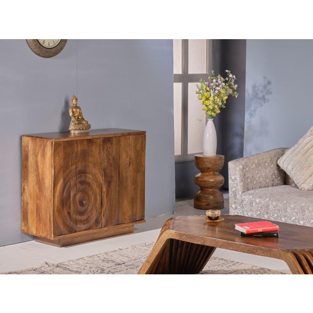 The Oakridge Two Doors Wood Accent Cabinet delivers functional storage wrapped in warm, natural wood character. An accent...
