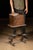 Early 20th-century Colonial Revival smoking stand constructed from walnut and incorporating a copper-lined humidor...