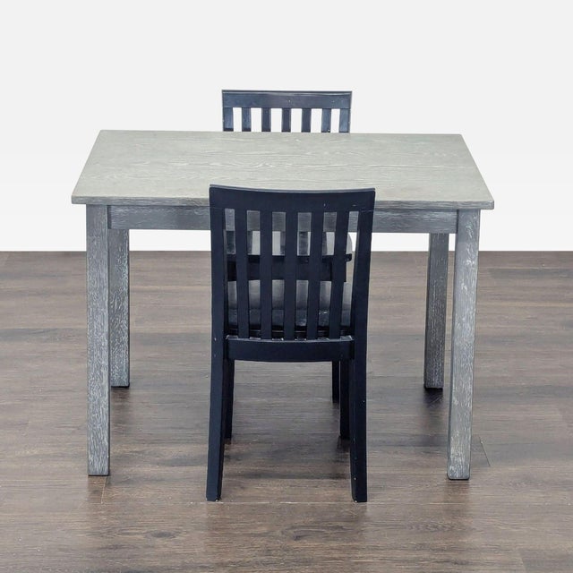 Solid wood Carolina kids table by Pottery Barn Kids in neutral gray finish. Classic slat design, sturdy construction,...