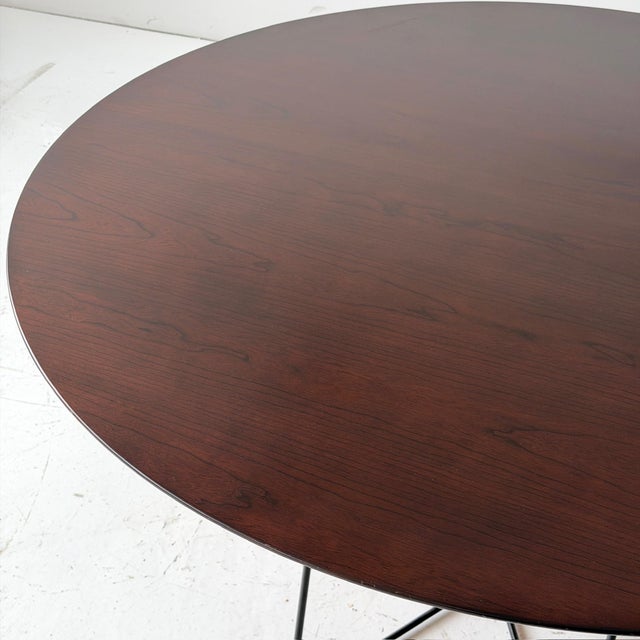 c. 1990s. USA. Walnut maroon stained top with metal base.