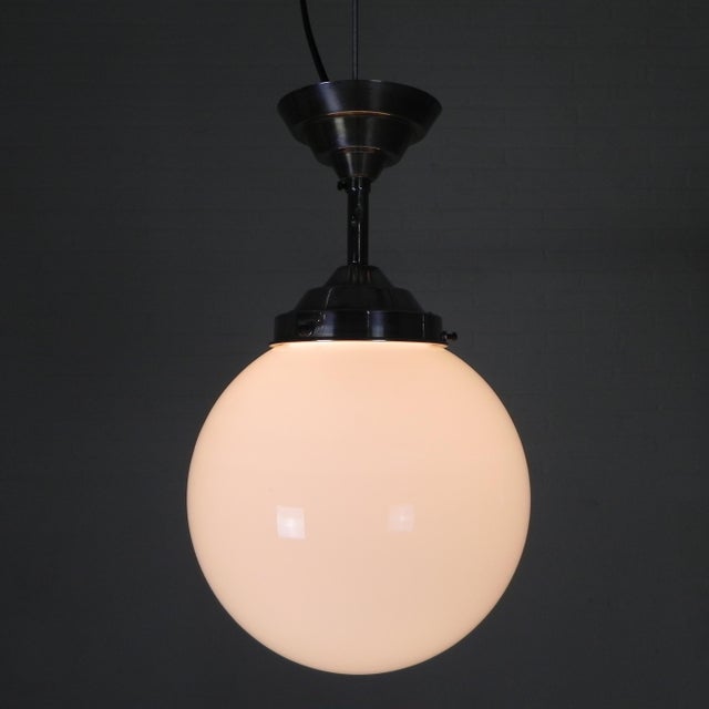 Height: 40 cm. ø: 25 cm. the lamp is fitted with new wiring and a large socket (e27). origin: france, 1930s. material:...