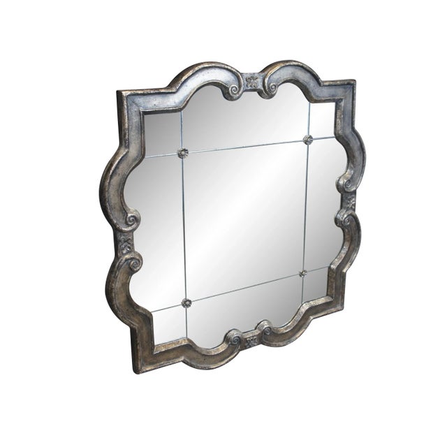 Pair of Uttermost model number 12597 P Prisca quatrefoil wall mirrors. Features a paneled architectural design studded...