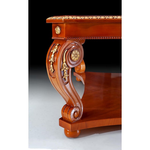 Handcrafted in Italy, this square coffee table features a beautifully inlaid burl veneer top with decorative detailing and...