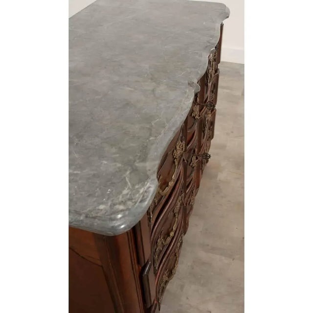 Dimensions: 37-½”H x 49”W x 24”D A handsome Louis XV style commode circa 1800 or earlier. The fantastic charcoal marble...