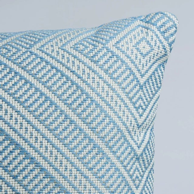This pillow features Tortola with a Knife Edge finish. Inspired by basket designs, this concentric diamond pattern is...