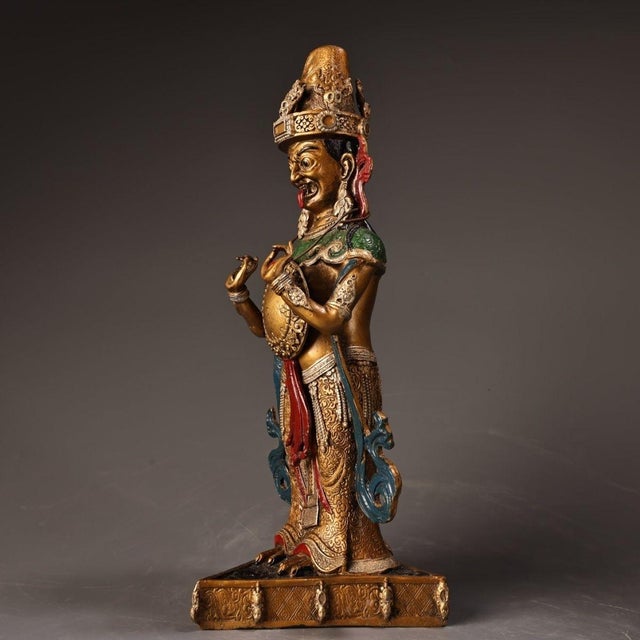 This striking vintage statue depicts Zasram (also known as Zaoxiang or a fierce protector deity in Tibetan Buddhist...