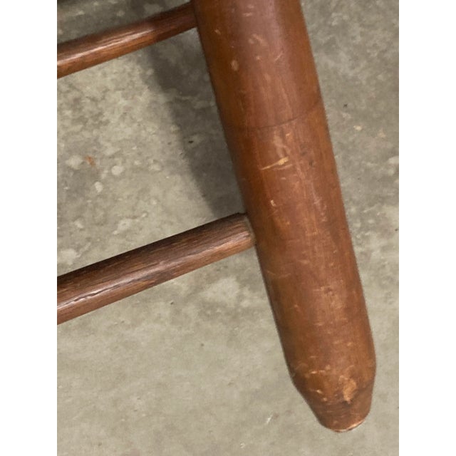 Charming antique 19th century Windsor thumb back chair. The chair is smaller in scale and a very cool antique accent piece...