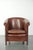We are offering this English-style cowhide leather club armchair in a beautiful dark cognac color, finished with...