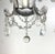 French (4) light rock crystal beaded chandelier with garlands. This chandelier is a classic design with four arms , each...