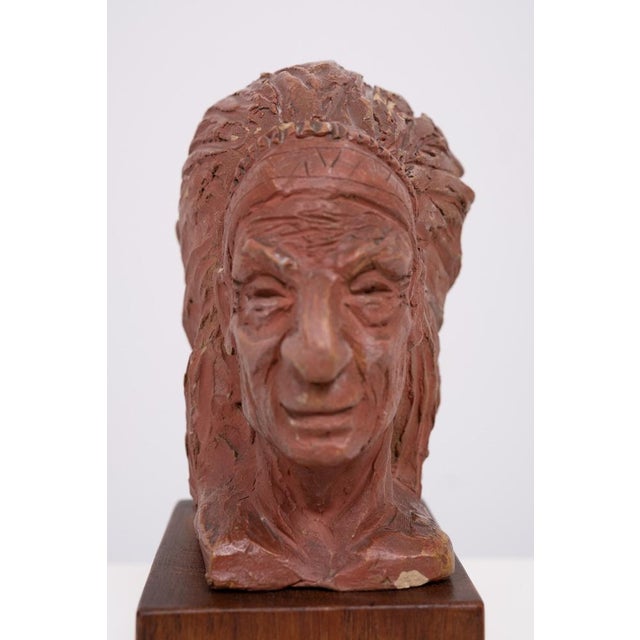 Small Old Indian Bust . Terracotta on a Wooden stand . Unknown Maker