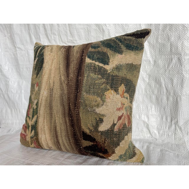 This authentic seventeenth century Flemish tapestry pillow is crafted from a rare fragment of an antique woven wall...