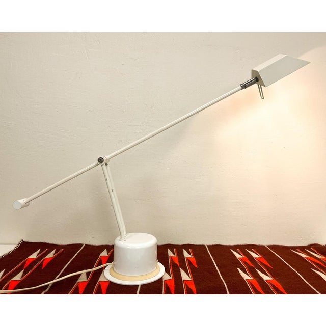 Postmodern desk lamp from the Massive brand, originating from Belgium. The arm and the lampshade are adjustable in...