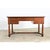 A handsome French Empire desk made of mahogany that has been recently refinished to preserve the beautiful color and grain...