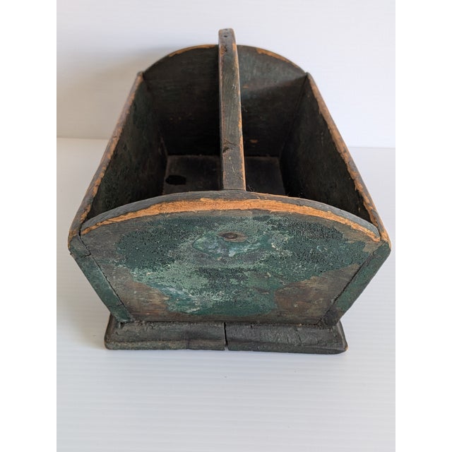 19th Century American green painted pine 2 section cutlery style tray with carrying handle. Has rectangular head nails...