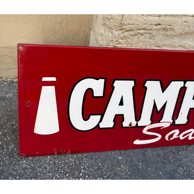 Vintage Campari Soda advertising sign in enameled metal, an original from the period, with classic red and white graphics....