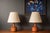 Vintage Pair of Scandinavian Modern lamps circa 1960s. This unique set features a sculptural solid turned base in old...
