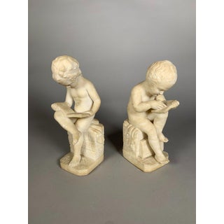 Two 19th Century Marble Sculptures: The Child Scribe and The Reader, After Lemire For Sale