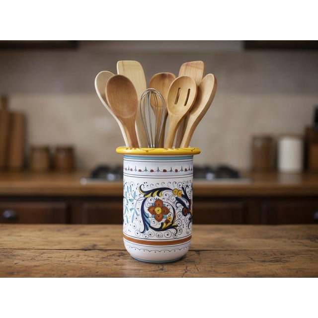 Fun and lovely Italian majolica pottery jar, handcrafted and hand-painted by an artisan in Deruta, Italy, featuring...