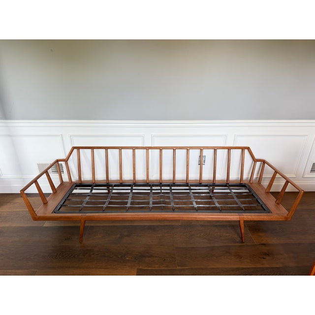 An exceptional and increasingly rare rail-back sofa designed by renowned American modernist Mel Smilow for Smilow-Thielle,...