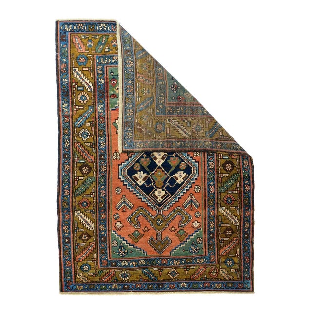 The numerous rugs of the famous NW Persian weaving district, from small scatters to giant carpets and a few runners, in...