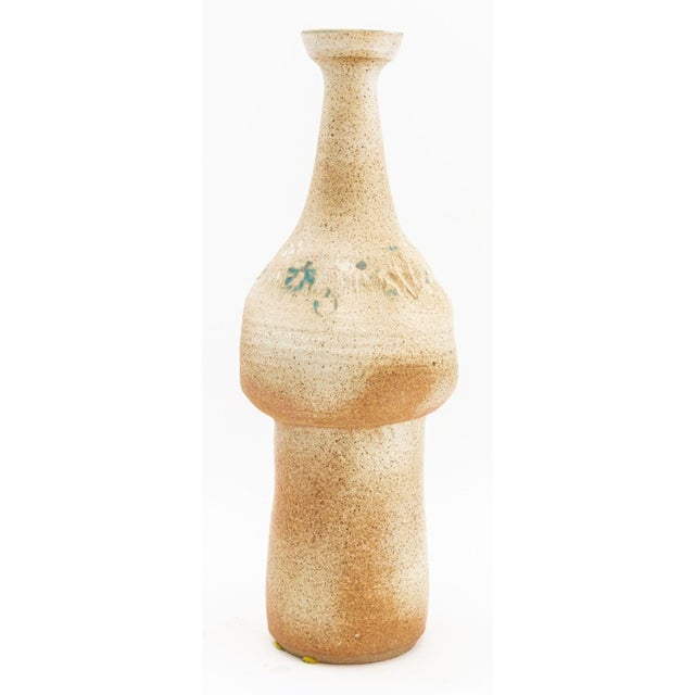Mid-Century Modern Floral Motif Stoneware Vase, turquoise glaze highlights, illegibly signed to underside. 20.5" H x 8" W....