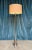 A handsome French Neoclassical floor lamp dating from the 1940s, distinguished by its elegant proportions and refined...