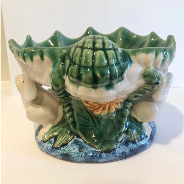 Vintage whimsical majolica pedastal bowl. Frogs holding up a clam shaped bowl. Hand painted. Some crazing due to age but...