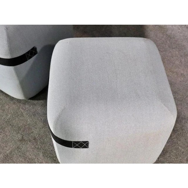 Pair of ottomans by Piero Lissoni for his 'Season' collection. Great for use in the home or office.