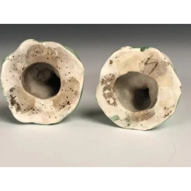 Pair antique 18th c. Chelsea Derby porcelain figures of putti or children holding baskets of flowers. Each measures 4"...