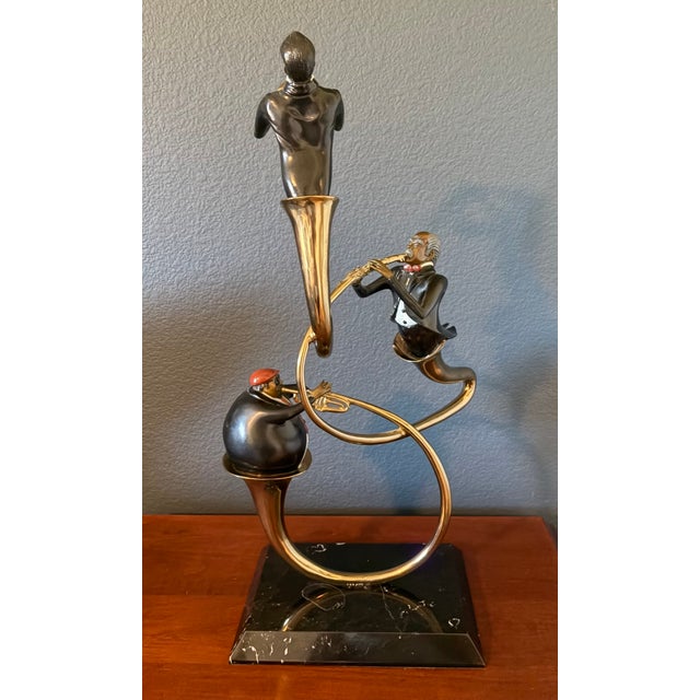 "Swingin Blowing Playin" is a 29" monumental sculpture by Paul Wegner (1950-2025). The sculpture is in Mint Condition and...