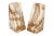 A pair of wedge shaped bookends made of onyx. Richly banded and swirling patterns in tan, caramel and cream form the...