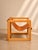 Handcrafted suspended leather lounge chair made from solid wood and thick full-grain leather. Designed with a clean...